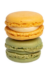 Pastries, desserts and sweets. Close-up of a yellow lemon macaroon and a a green pistachio macaroon isolated on a white background. Macro photograph.