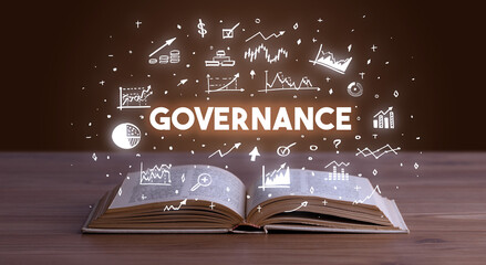 GOVERNANCE inscription coming out from an open book, business concept