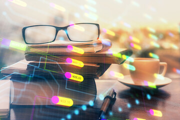 Data tech hologram with glasses on the table background. Concept of technology. Double exposure.