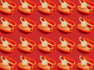 Fototapeta na wymiar Red paprika pepper sliced. Food pattern top view