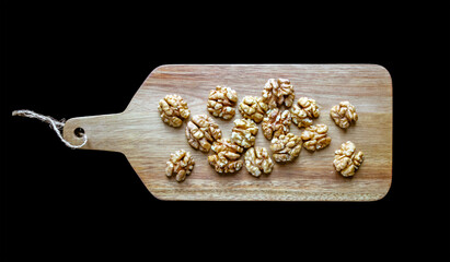 Walnut kernels on a cutting board