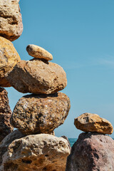 Minimalist aesthetics. Stones against the background of the sky