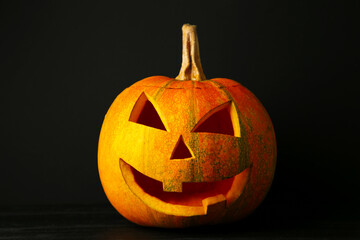 Halloween pumpkin head jack lantern on black background