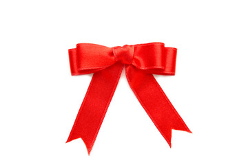 Shiny red satin bow isolated on white background.