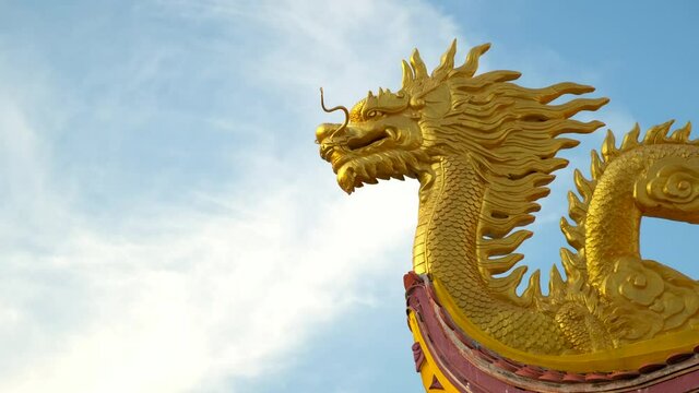 Golden dragon statue on Buddhist pagoda