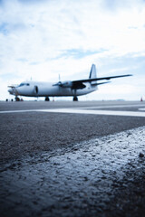 Fototapeta na wymiar Cargo airplane parked during maintenance check