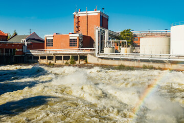 Kouvola, Finland - 15 September 2020: Old red brick buildings of Upm factory on rapids Kuusankoski...