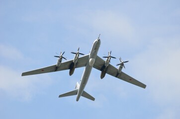 Holiday on May 9, Victory Day. Flying plane over houses. The city of Murmansk.