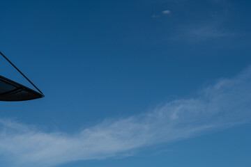 satellite dish against blue sky