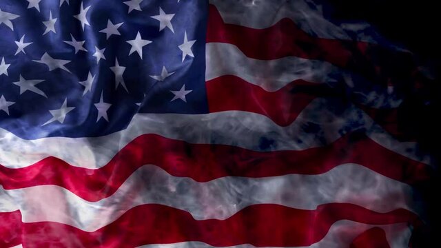 Waving the American flag. Mysterious flag flying through the smoke. The flag in the fog.