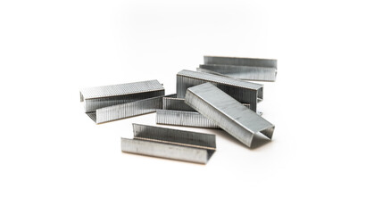 Set of stapler staples paper clips on white isolated background