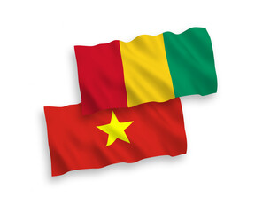 Flags of Guinea and Vietnam on a white background
