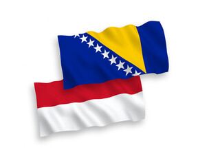 Fototapeta premium Flags of Indonesia and Bosnia and Herzegovina on a white background
