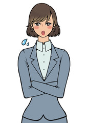 腕組みをして焦りを感じている様子のスーツを着た女性