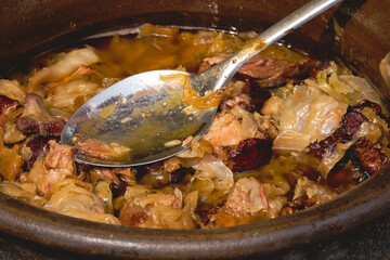 Traditional Balkan winter dish -  cabbage rolls filled with minced meat, rice, fried onion and carrot called sarma