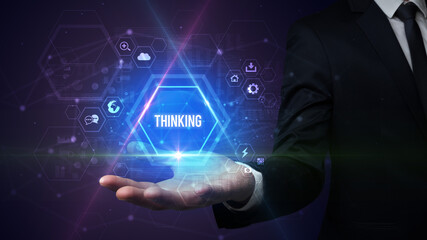Man hand holding THINKING inscription, social media concept