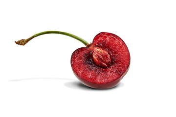 One cutted in half red sweet cherry with pit and stem isolated on white background. Close up, copy...