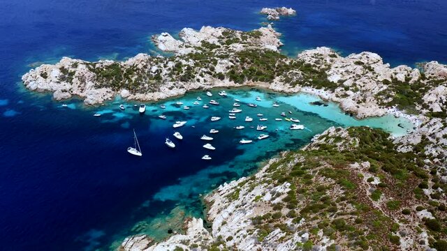 Aerial Drone View over Beautiful Cala at Caprera Island, Sardinia, Italy.
Rocky Coastline. Turquoise Cristal Clear Sea.