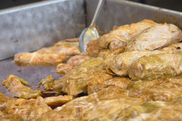 Traditional Balkan winter dish -  cabbage rolls filled with minced meat, rice, fried onion and carrot called sarma