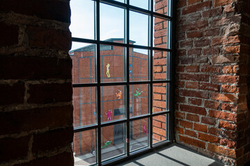 Fototapeta premium Łódź miasto manufaktura widok z okna cegła