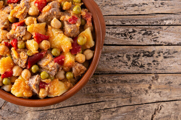 Ropa vieja food in bowl on wooden table. Top view.Copy space