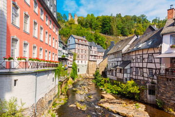 Half-timbered houses along the Ruhr river in Monschau. Monschau is a small town in the Eifel region of western Germany, located in the Aachen district of North Rhine-Westphalia.