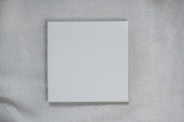 white rectangular canvas on fabric cotton texture background
