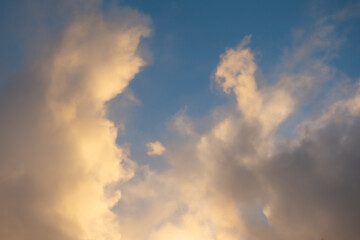 Fototapeta premium Pink clouds illuminated by the sun