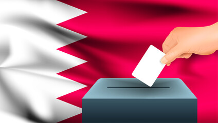 Male hand puts down a white sheet of paper with a mark as a symbol of a ballot paper against the background of the Bahrain flag. Bahrain the symbol of elections