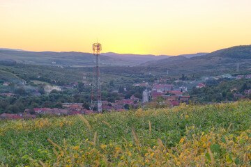 Obraz premium Beautiful sunset over a village in Transylvania