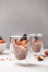 Breakfast with granola. Granola with Chia and apricot. Light background. Healthy breakfast. Wholesome breakfast