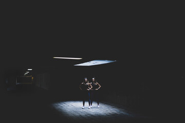 Closeup of two attractive females running and doing exercises - concept of fitness and sport