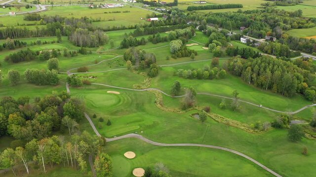scenic golf course smooth rotating aerial.