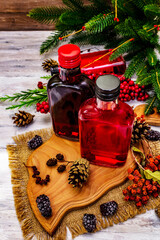 New Year Festive berries liqueur or tincture as ingredient for preparation alcohol cocktail