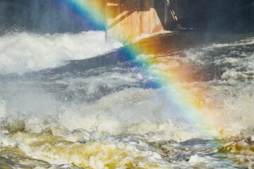 Beautiful rainbow on bypass at rapids Kuusankoski, Finland