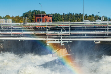 Beautiful rainbow on bypass at rapids Kuusankoski, Finland