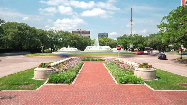 This video is about a time lapse of cars near big water fountain in the Houston museum district. This video was filmed in 4k for best image quality.