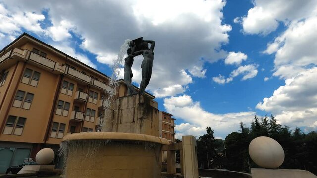 the luminous fountain  in the historic center of L'Aquila with two female nudes
