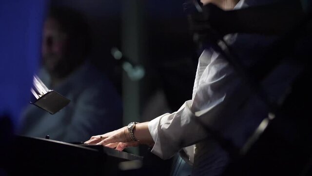 Piano player in slow motion symphony