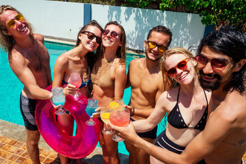 indian handsome long wet haired man in pink sunglasses , happy friends background chill out mood