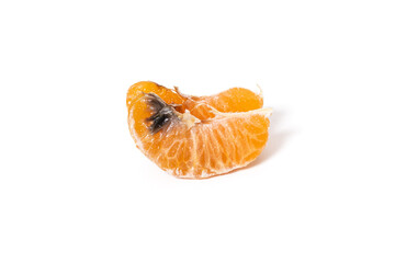 Bad moldy mandarin isolated on white background.