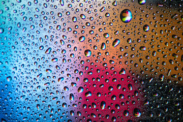 Macro water droplets with colour backgrounds 