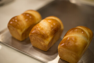 donuts and bread on tray 