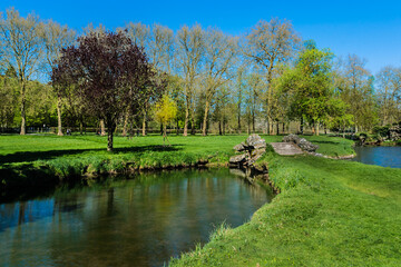 Fototapeta premium Picturesque Public Park and canal in town of Rambouillet. Rambouillet, Yvelines department, Ile-de-France region, 50 km southwest of Paris. France.