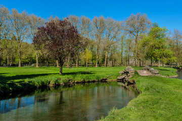 Fototapeta na wymiar Picturesque Public Park and canal in town of Rambouillet. Rambouillet, Yvelines department, Ile-de-France region, 50 km southwest of Paris. France.