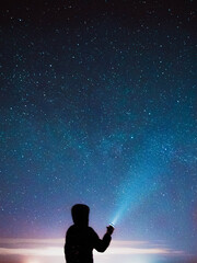 Fototapeta na wymiar person looking at the night sky 