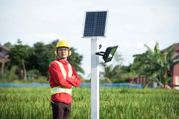 Man during the installation of solar photovoltaic panels in agricultural areas