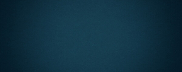 Texture of old navy blue paper closeup
