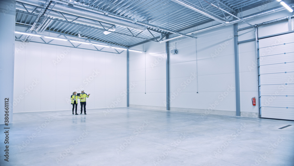 Poster Industry 4.0 Modern Factory: Two Engineers in Empty Warehouse Use Digital Tablet Computer with Augmented Reality Software Visualizing of Manufacturing Plant Room Mapping. Illustrative Mock-up Concept