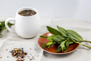 herbal detox tea on white table cloth